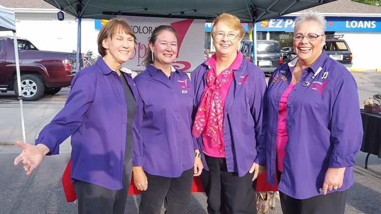 Four chorus members at a Booth for Lafayette Art Night 2015