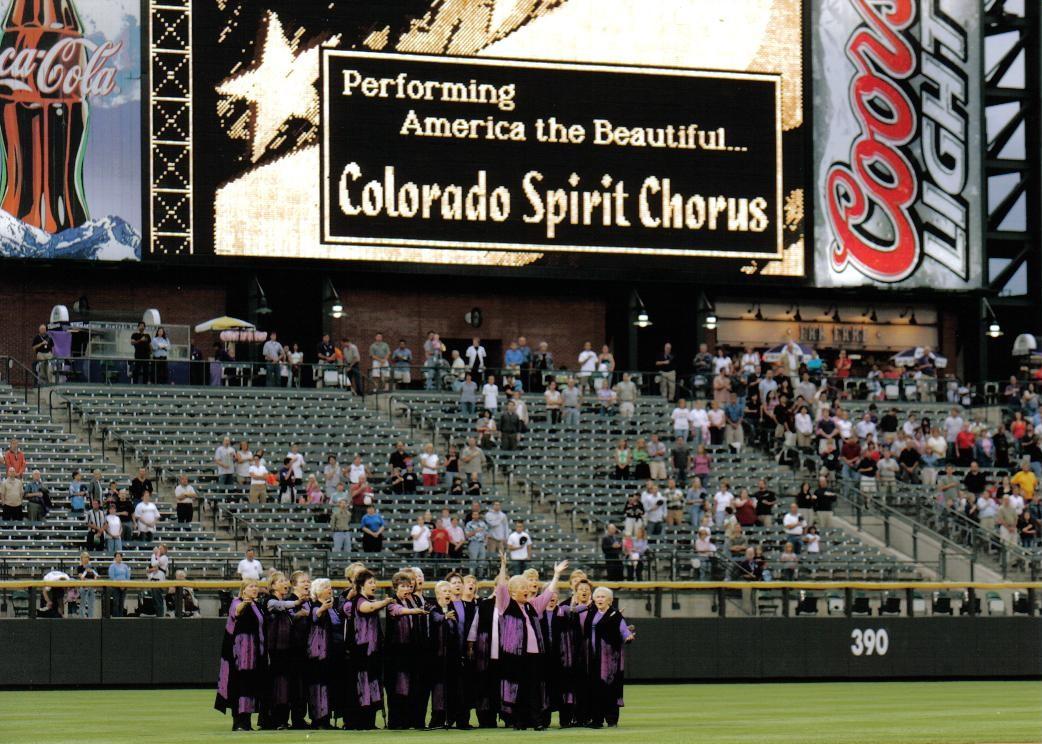 The chorus performing the National Anthem for a Colorado Rockies game